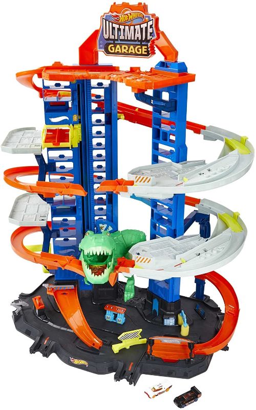 Photo 1 of Hot Wheels City Robo T-Rex Ultimate Garage, Multi-level Multi-Play Mode, Stores 100 Plus 1:64 Scale Cars, Gift Idea for Kids 3 and Older
