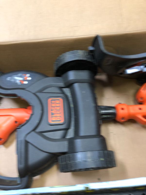 Photo 2 of BLACK+DECKER 120V 6.5 Amp Compact 12 in. Corded 3-in-1 Lawn Mower. Heavy Use, Grass Stains on Item. Scratches and Scuffs on ITem. 