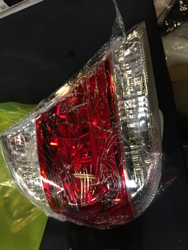 Photo 1 of 2005-2006 Toyota Camry - Driver Side Tail Light, With bulb(s) - Clear & Red Lens, SE Model, 