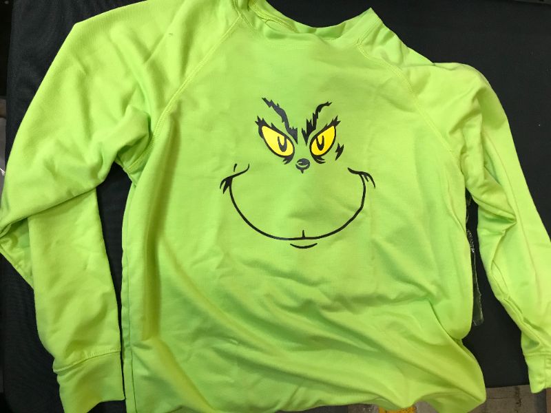 Photo 1 of young adults Grinch shirt long sleeve color green size large 