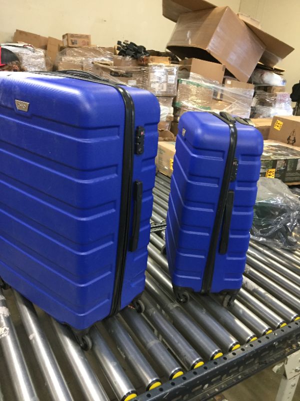 Photo 1 of 2 piece luggage set blue 27" and 23"