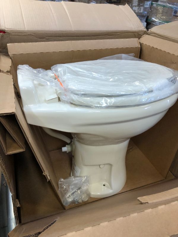 Photo 1 of Dometic 320 Series Standard Height RV Toilet, Bone
