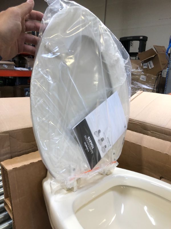 Photo 1 of Dometic 320 Series Standard Height RV Toilet, Bone
