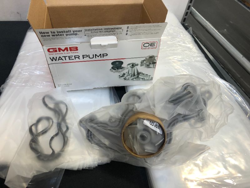 Photo 2 of 2010 Lincoln MKS Engine Water Pump GMB Engine Water Pump 125-9060