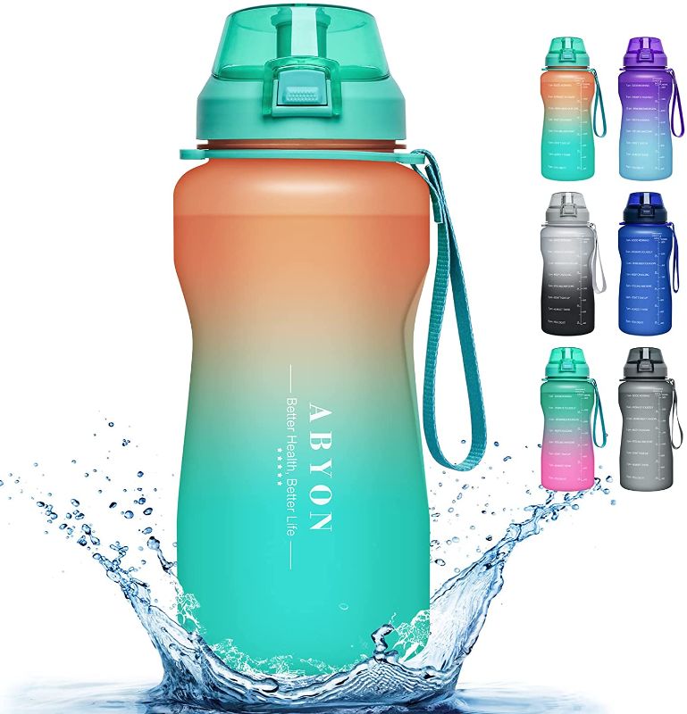 Photo 1 of ABYON Water Bottle with Removable Straw - Half Gallon / 64Oz Container with Hydration Measurements - Leak & Dust-Proof, Thick Bottom - Non-BPA, Tritan Plastic, Paracord Handle
