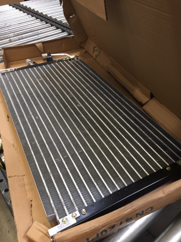 Photo 1 of UAC CN 4720PFC A/C Condenser --- PRODUCT IS SILVER 
