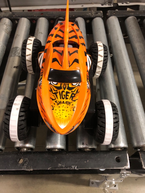 Photo 3 of Hot Wheels Rc Monster Trucks Unstoppable Tiger Shark in 1:15 Scale, Remote-Control Toy Truck with Terrain Action Tires