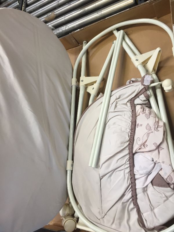 Photo 1 of Delta Children Deluxe Sweet Beginnings Bedside Bassinet - Portable Crib with Lights and Sounds, Falling Leaves
