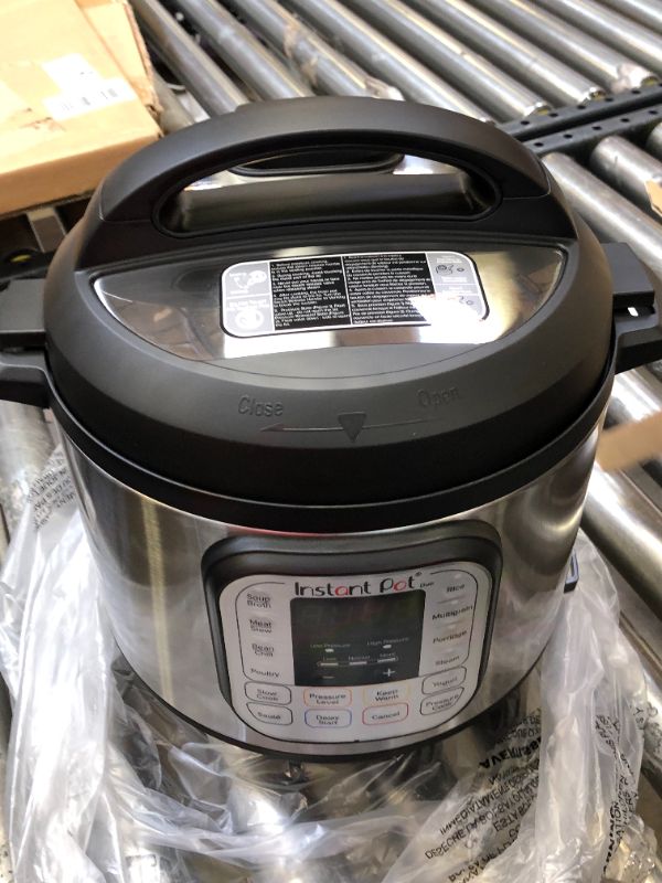 Photo 2 of Instant Pot Duo 7-in-1 Electric Pressure Cooker, Slow Cooker, Rice Cooker, Steamer, Sauté, Yogurt Maker, Warmer & Sterilizer, 6 Quart, Stainless Steel/Black
