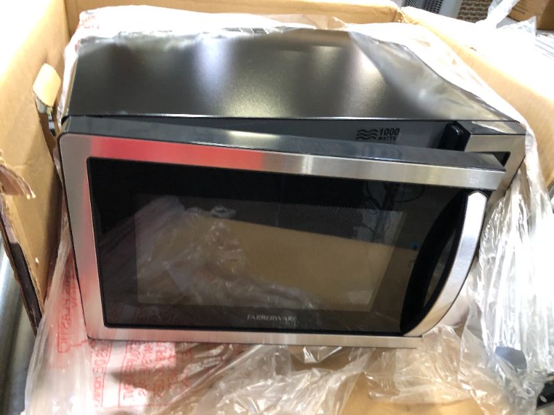 Photo 2 of Farberware Countertop Microwave 1.1 Cu. Ft. 1000-Watt Compact Microwave Oven with LED lighting, Child lock, and Easy Clean Interior, Stainless Steel Interior & Exterior
