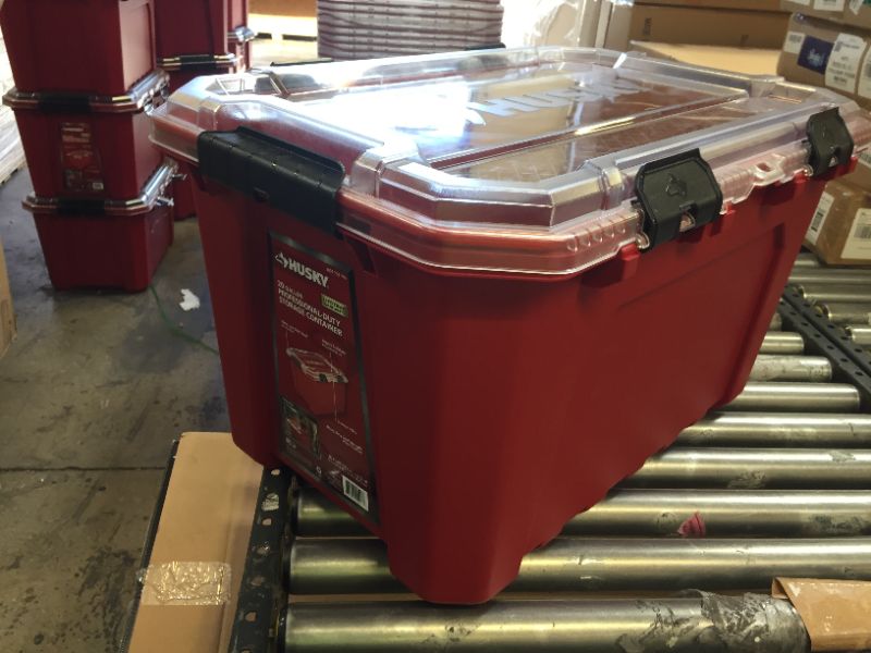 Photo 2 of 20-Gal. Professional Duty Waterproof Storage Container with Hinged Lid in Red, PRODUCT NEW BUT MINOR MARKINGS FORM NOT BEING PACKAGED
