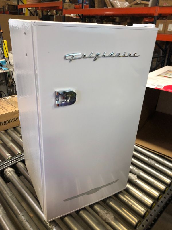 Photo 2 of Frigidaire EFR376-WHITE 3.2 Cu Ft White Retro Bar Fridge with Side Bottle Opener
