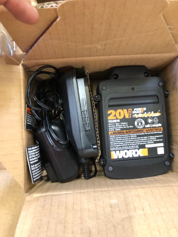 Photo 1 of WORX WG261 20V Power Share 22-inch Cordless Hedge Trimmer, Battery and Charger Included with Power Share 4.0 AH Battery, Orange and Black
