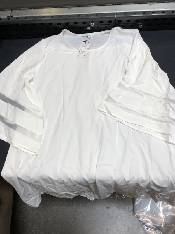 Photo 1 of WOMENS WHITE SHIRT SIZE LARGE 