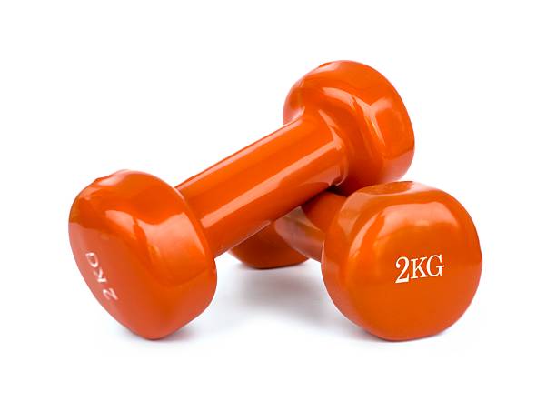Photo 1 of 2KG orange dumbbell with resistance band