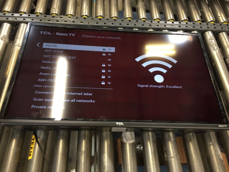 Photo 3 of TCL 32-inch 1080p Roku Smart LED TV - 32S327---FLICKERS EASAILY WHEN MOVED OR TAPPED---