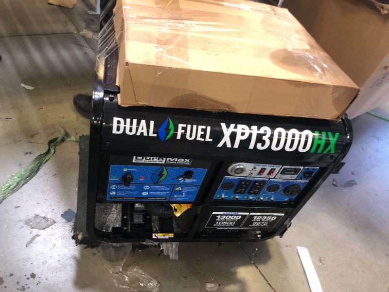 Photo 3 of 13000/10500-Watt Dual Fuel Electric Start Gasoline/Propane Portable Home Power Back Up Generator with CO Alert Shutdown---oil residue on product. unable to test funcitonality. 