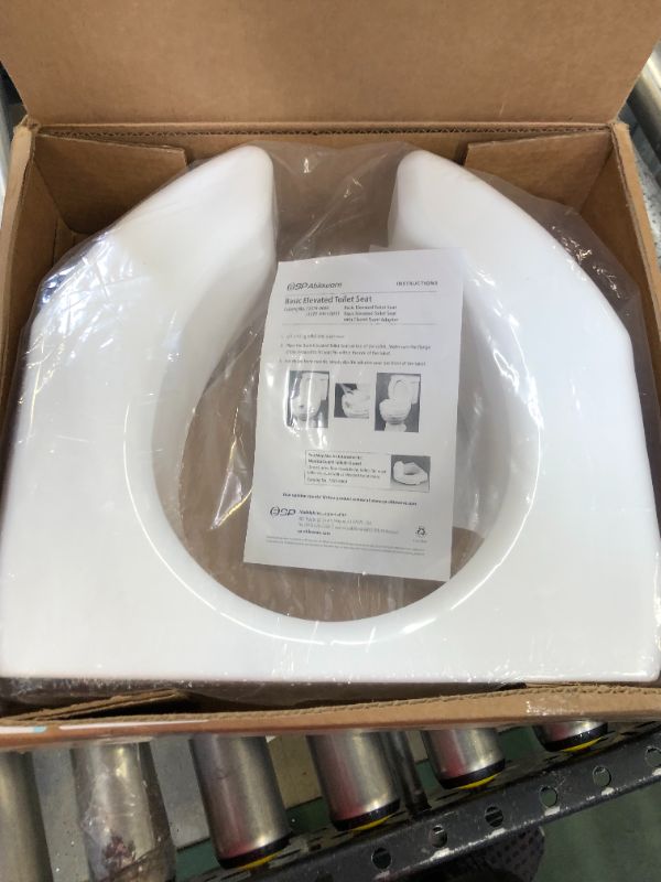 Photo 2 of Ableware Basic Open Front Elevated Toilet Seat, White