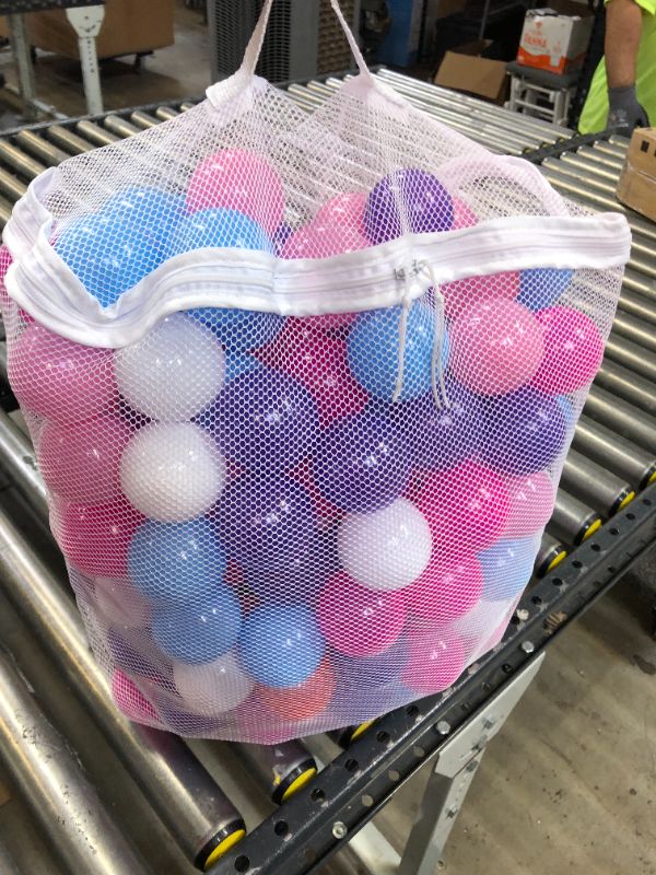 Photo 1 of bag of colored balls 