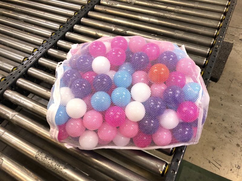 Photo 1 of bag of colored balls 