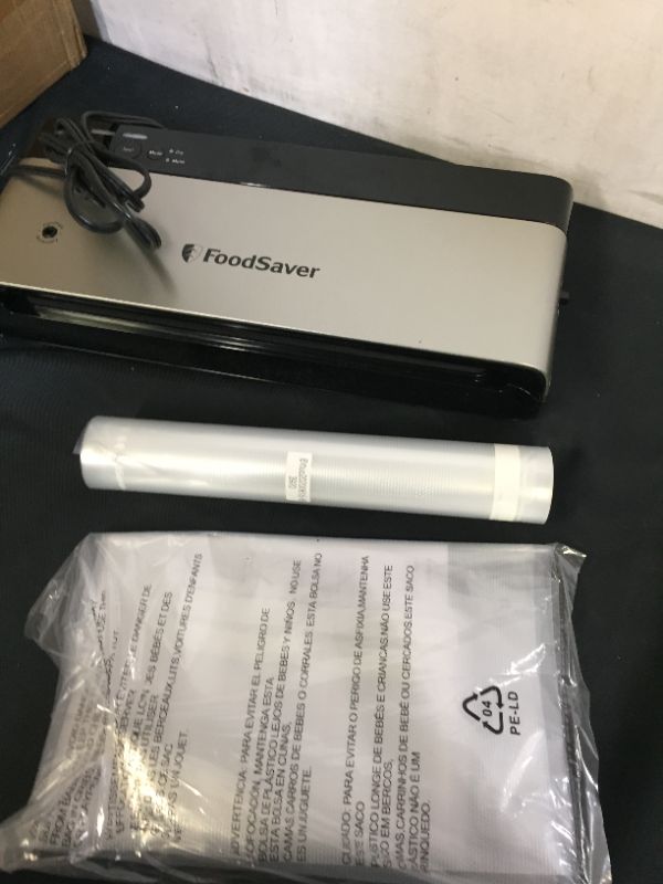 Photo 3 of  FoodSaver VS0150 Sealer PowerVac Compact Vacuum Sealing Machine, Vertical Storage, Black (DOSENT TURN ON,UNABLE TO TEST)