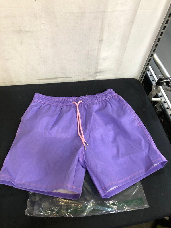 Photo 1 of MENS PURPLE AND PINK SWIM TRUNKS SIZE S 