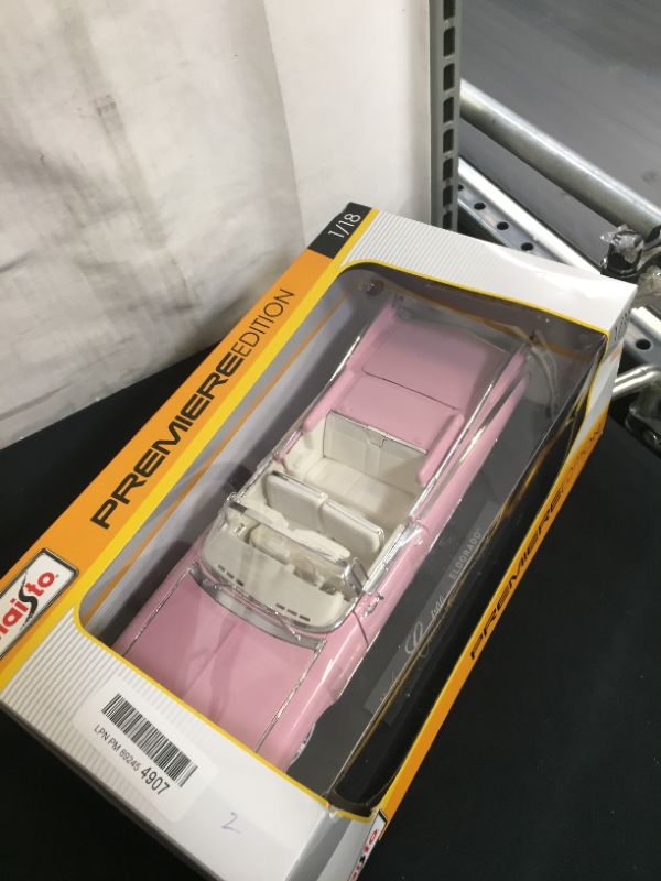 Photo 4 of 1959 Cadillac Eldorado Biarritz Convertible, Pink - Maisto Premiere 36813 - 1/18 Scale Diecast Model Toy Car by Maisto
(factory sealed)