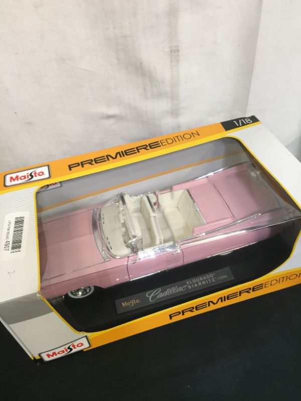 Photo 5 of 1959 Cadillac Eldorado Biarritz Convertible, Pink - Maisto Premiere 36813 - 1/18 Scale Diecast Model Toy Car by Maisto
(factory sealed)