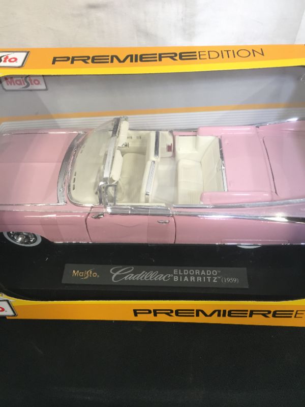 Photo 3 of 1959 Cadillac Eldorado Biarritz Convertible, Pink - Maisto Premiere 36813 - 1/18 Scale Diecast Model Toy Car by Maisto
(factory sealed)