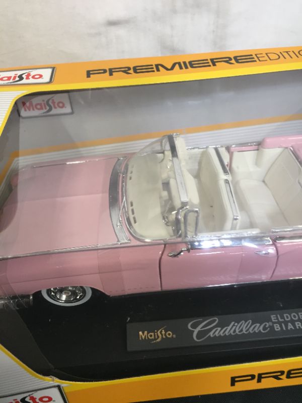 Photo 2 of 1959 Cadillac Eldorado Biarritz Convertible, Pink - Maisto Premiere 36813 - 1/18 Scale Diecast Model Toy Car by Maisto
(factory sealed)