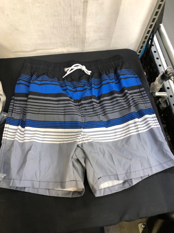 Photo 1 of MENS SWIM TRUNKS SIZE M 