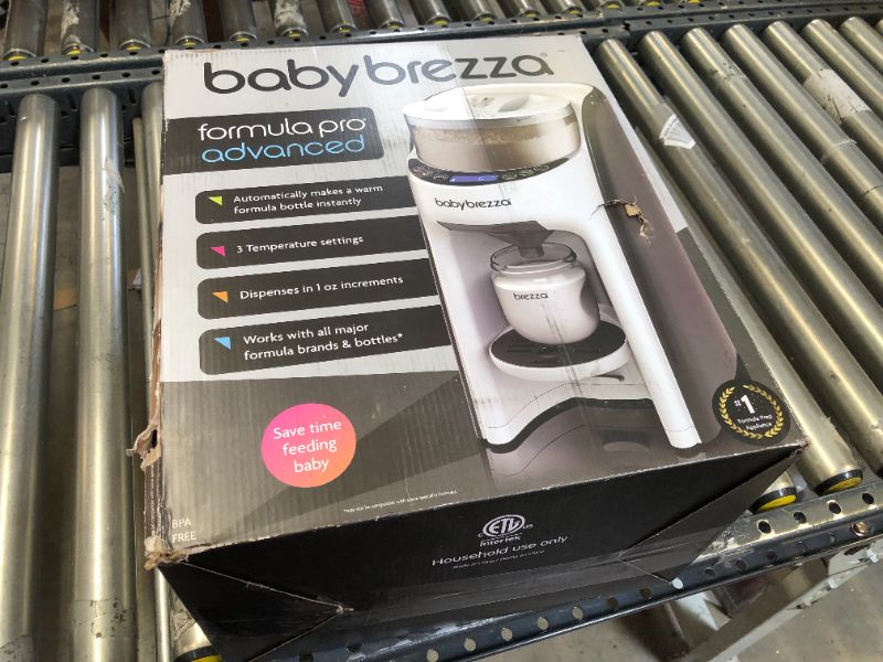Photo 1 of New and Improved Baby Brezza Formula Pro Advanced Formula Dispenser Machine - Automatically Mix a Warm Formula Bottle Instantly - Easily Make Bottle with Automatic Powder Blending
