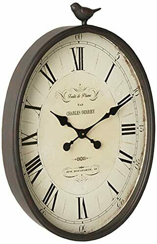 Photo 1 of Creative Co-Op Oval Metal Wall Clock with Bird
