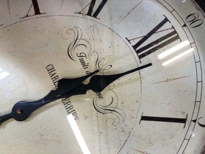 Photo 1 of Creative Co-Op Oval Metal Wall Clock with Bird
