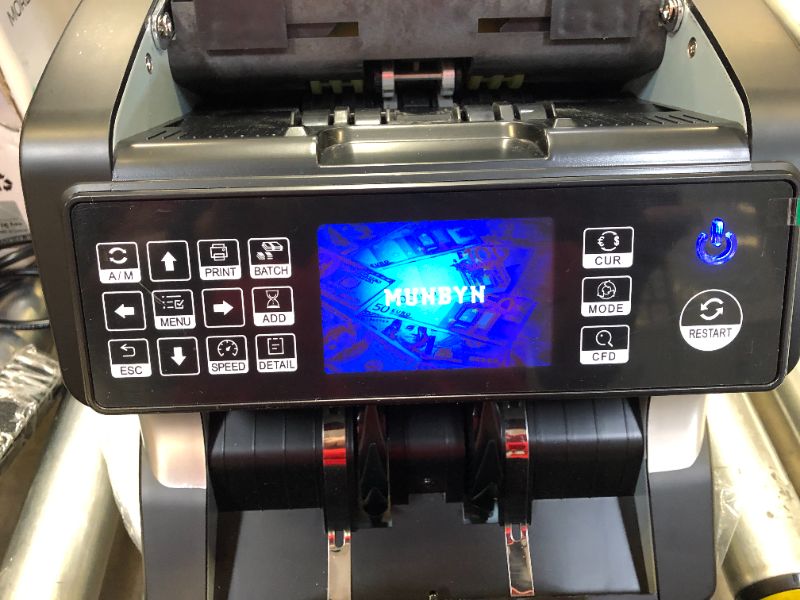 Photo 1 of MUNBYN Bank Grade Money Counter Machine Mixed Denomination, Value Counting, Serial Number, Multi Currency, Printer Enabled 2CIS/UV/IR/MG/MT Counterfeit Detection Bill Value Counter for Small Business
