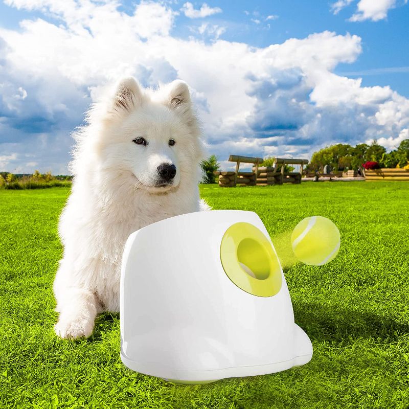 Photo 1 of PetPrime Dog Automatic Ball Launcher Dog Interactive Toy Dog Fetch Toy Pet Ball Thrower Throwing Game 3 Tennis Balls Tennis Ball Launcher for Dogs Included Launch Distance 10-30ft
