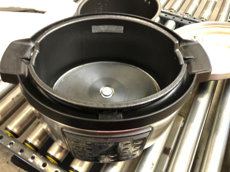 Photo 6 of Geek Chef 8 Qt 12-in-i Multiuse Programmable Electric Pressure Cooker Oval, Slow Cooker, Rice Cooker, Steamer, Sauté, Yogurt Maker and Warmer, Non-Stick Pot Has Cool-Touch Handles, EZ-Lock (GP80Plus)
used / dirty