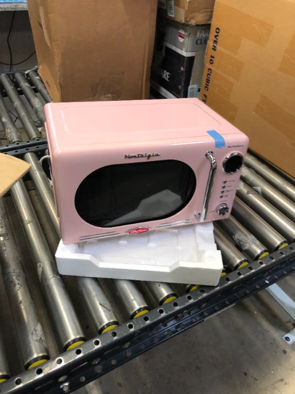 Photo 2 of Nostalgia Retro 0.7 Cubic Foot 700-Watt Countertop Microwave Oven, Cu. Ft, Pink
