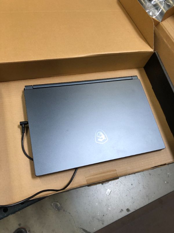 Photo 3 of MSI Stealth 15M Gaming Laptop: 15.6" 144Hz FHD 1080p Display, Intel Core i7-11375H, NVIDIA GeForce RTX 3060, 16GB, 512GB SSD, Thunderbolt 4, WiFi 6, Win10, Carbon Gray (A11UEK-009)
