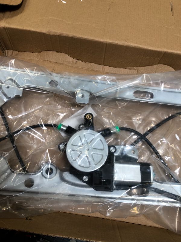 Photo 1 of Aftermarket front driver LH window regulator w/motor make and model unknown 