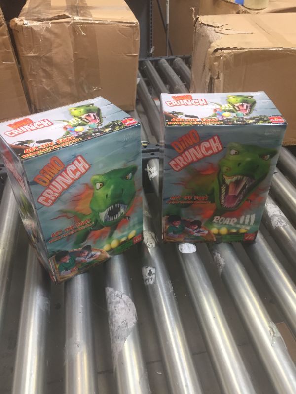 Photo 1 of 2--Goliath Dino Crunch Game-- factory sealed 

