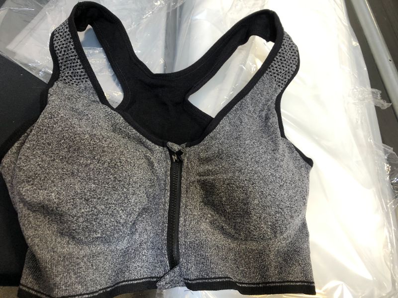 Photo 1 of WOMEN'S SPORTS BRA SIZE SMALL/MEDIUM