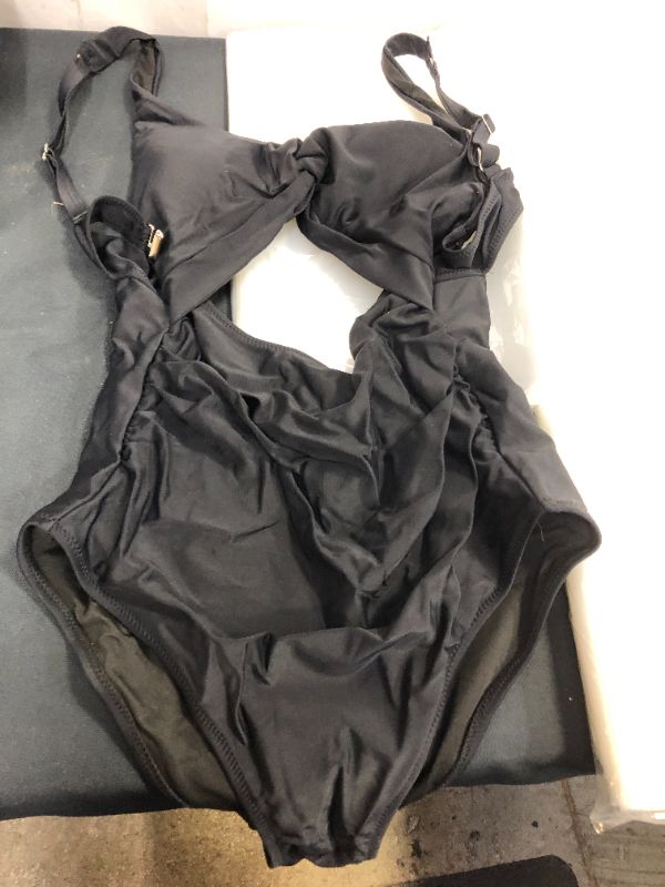 Photo 1 of WOMEN'S ONE PIECE SWIMSUIT SIZE MEDIUM