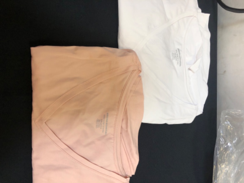 Photo 1 of WOMENS SHIRTS V NECK 2 PK SIZE XL WHITE AND PINK 