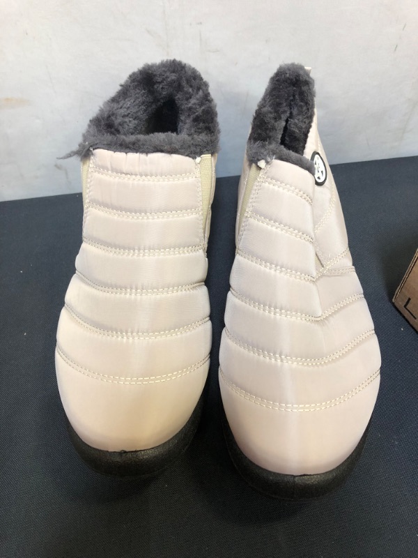 Photo 1 of WOMENS BROWN FUR BOOTS SIZE 10 (41)