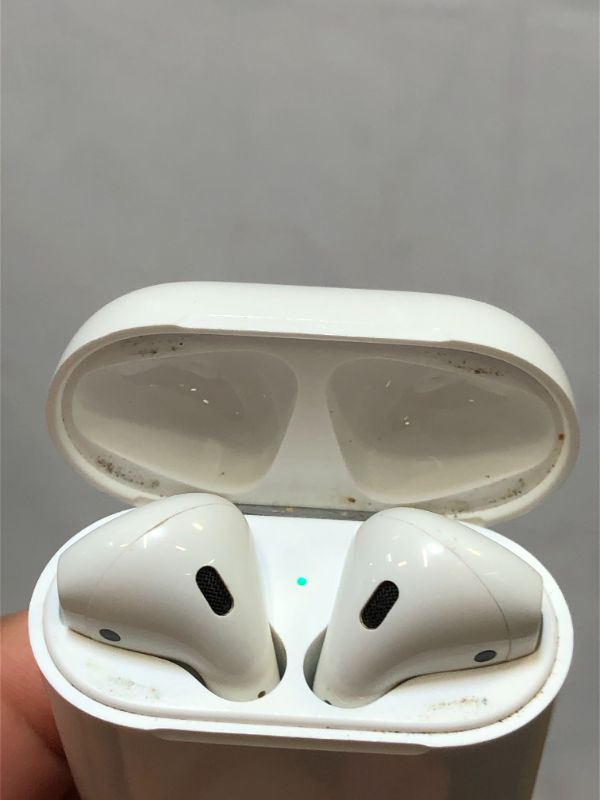 Photo 4 of Apple AirPods (2nd Generation) dirty from usage / missing charger / under Bluetooth name " Kamal Bhatias Airpods "
