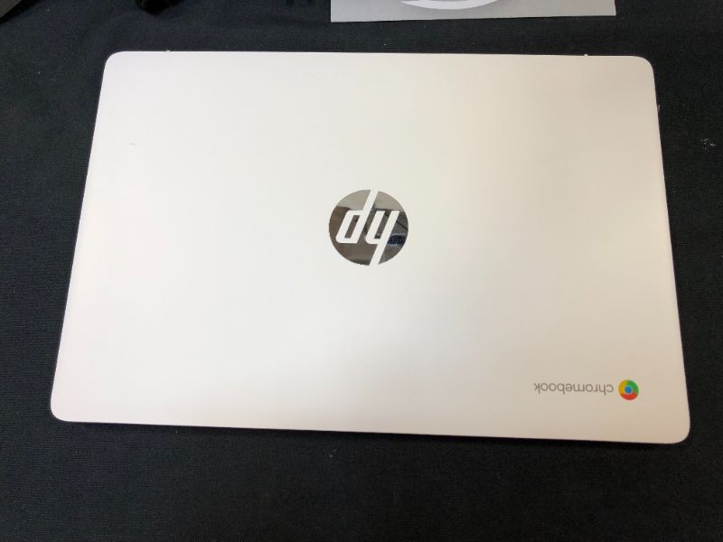 Photo 11 of TESTED - USED - HP Chromebook 14 Laptop, Intel Celeron N4020, 4 GB RAM, 32 GB eMMC, 14” HD Micro-Edge Display, Chrome OS, Thin & Portable, 4K Graphics, Snow White Keyboard (14a-na0023nr, 2021, Ceramic White)