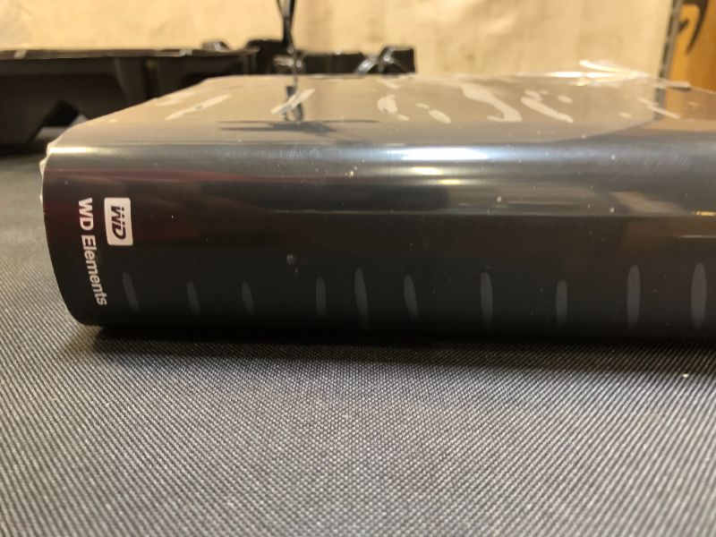 Photo 4 of TESTED - WD 14TB Elements Desktop Hard Drive HDD, USB 3.0, Compatible with PC, Mac, PS4 & Xbox - WDBWLG0140HBK-NESN
PACKAGING IS DAMAGED 