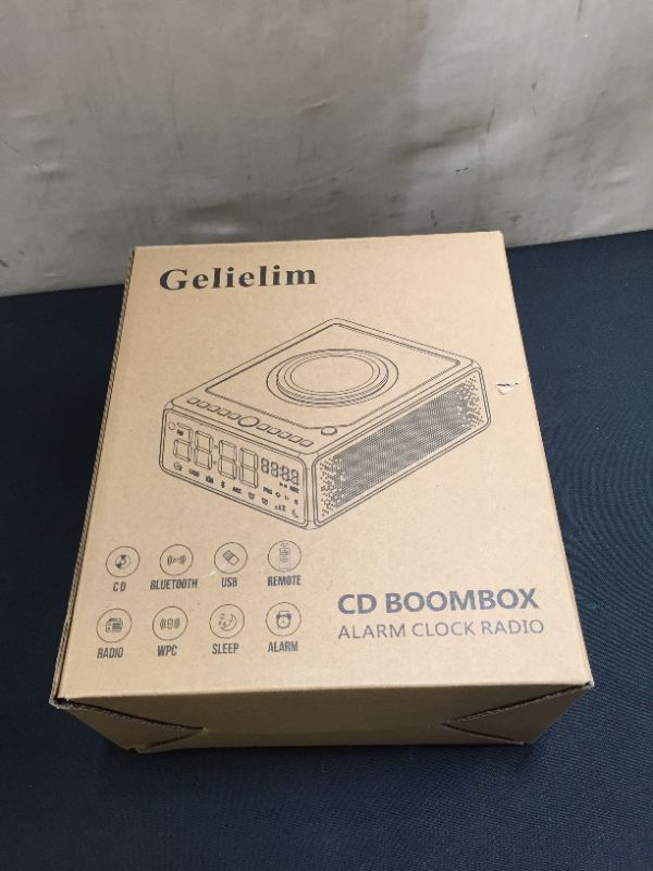 Photo 4 of Gelielim Clock Radio with Top Loading CD Player , Bedside FM Radio Dual Alarm Clock, Bluetooth Speaker Boombox, QI Wireless Charging, MP3/USB Audio Player, Dimmable LED Display, Remote Control
(UNABLE TO FULLY TEST, TURNS ON)