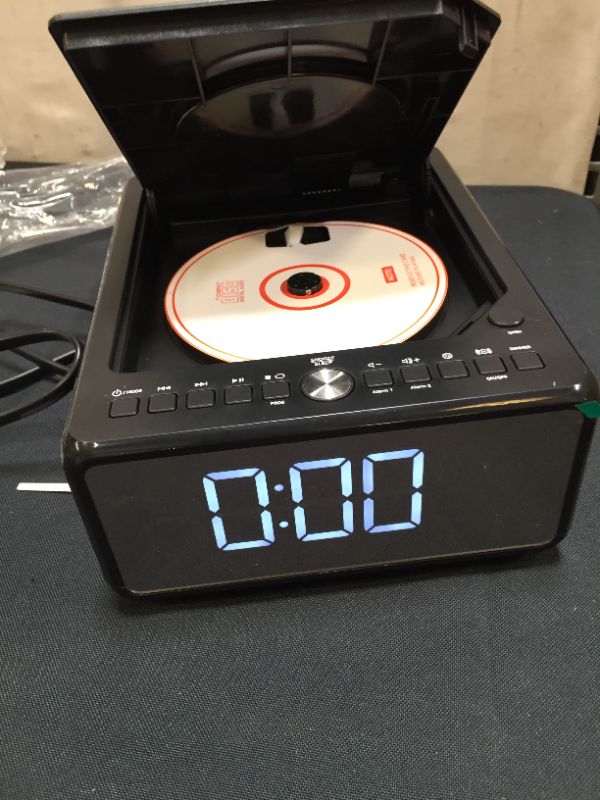 Photo 2 of Gelielim Clock Radio with Top Loading CD Player , Bedside FM Radio Dual Alarm Clock, Bluetooth Speaker Boombox, QI Wireless Charging, MP3/USB Audio Player, Dimmable LED Display, Remote Control
(UNABLE TO FULLY TEST, TURNS ON)